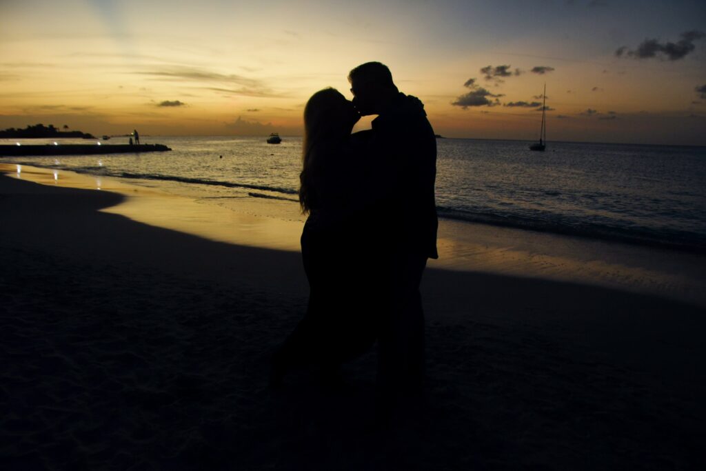 Lovers silhouetted by the Antiguan Sunset.